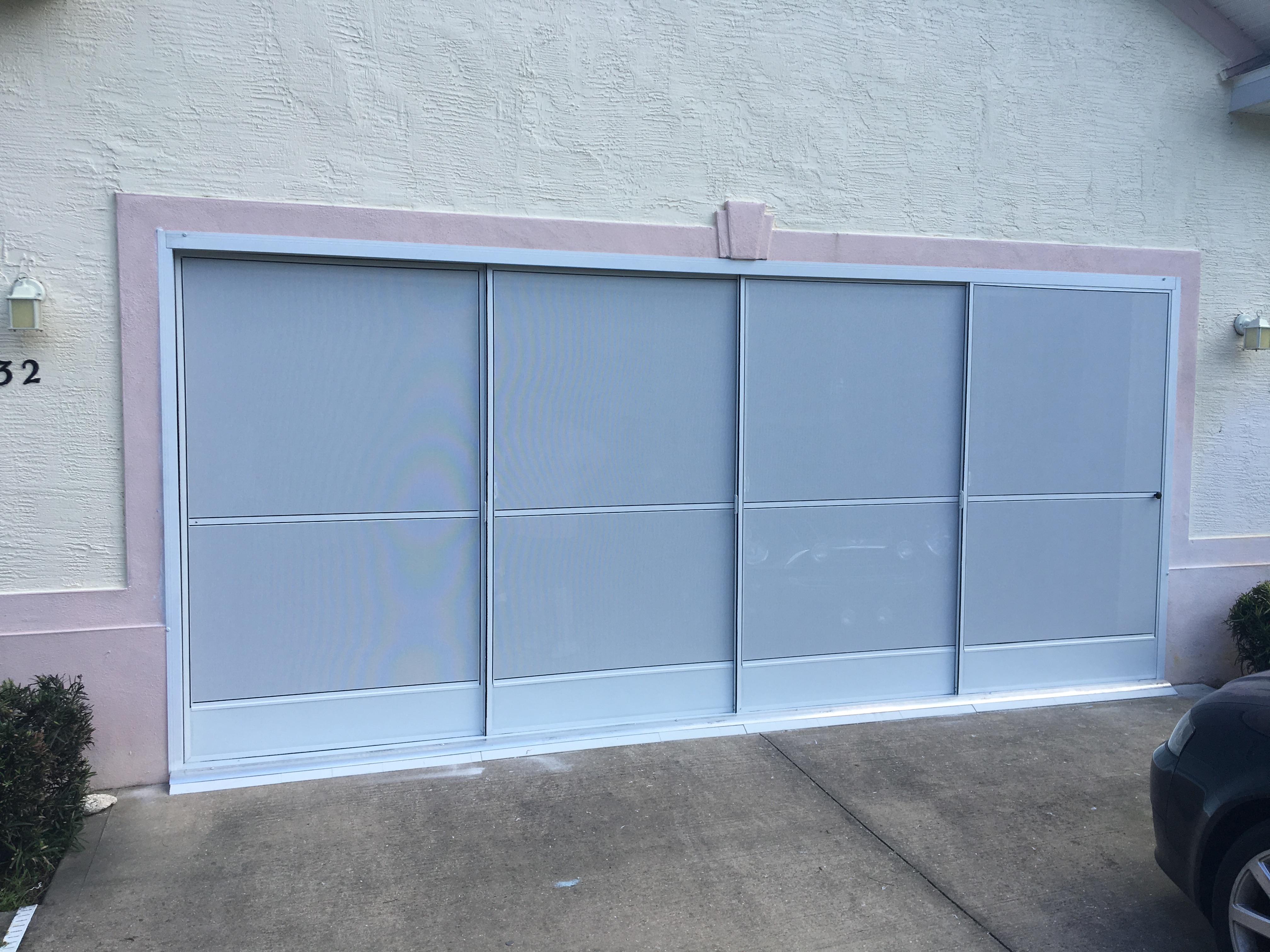 Garage Sliding Doors project by AllTech Screening in Volusia & Central Florida #1