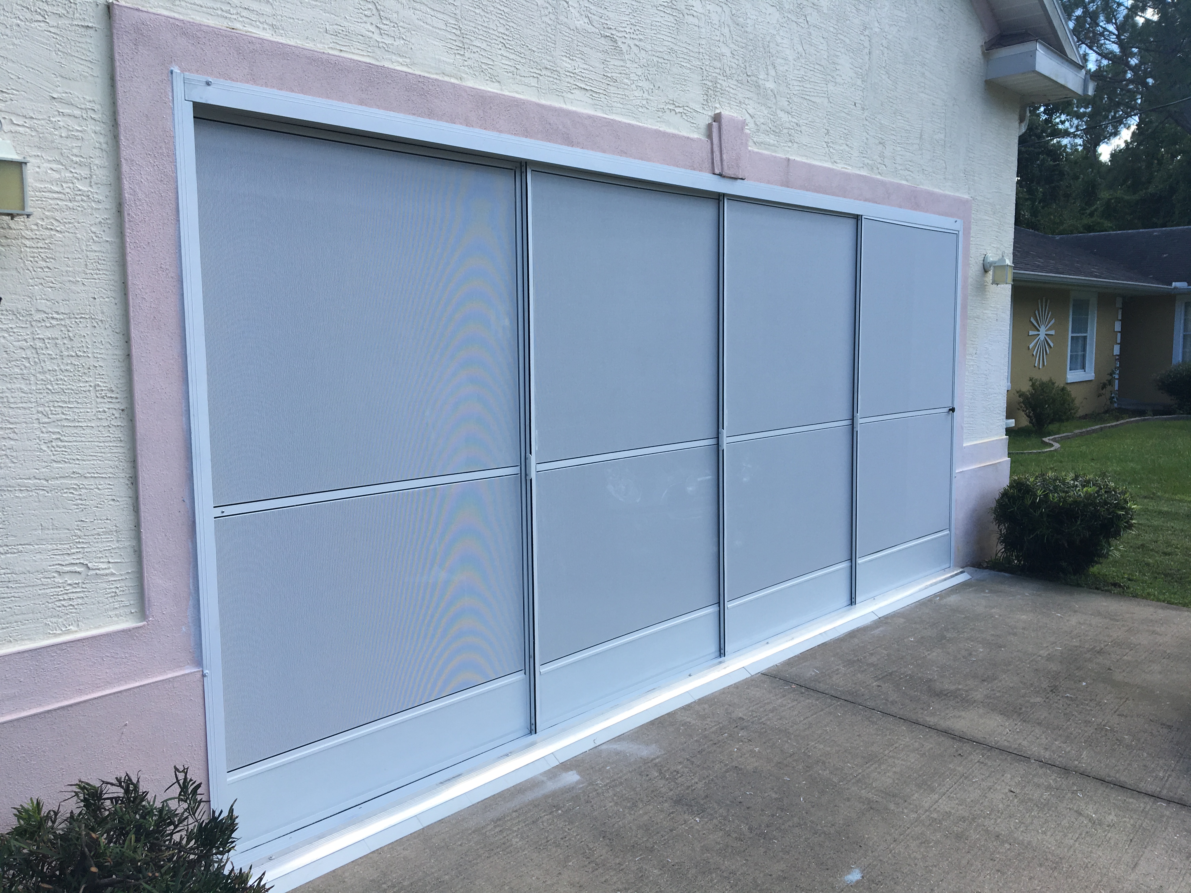 Garage Sliding Doors project by AllTech Screening in Volusia & Central Florida #2